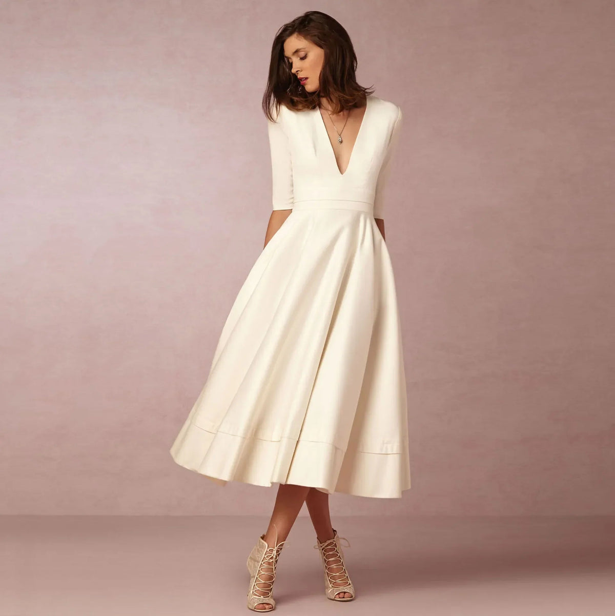 Vestito midi con scollo a V e maniche al gomito da donna