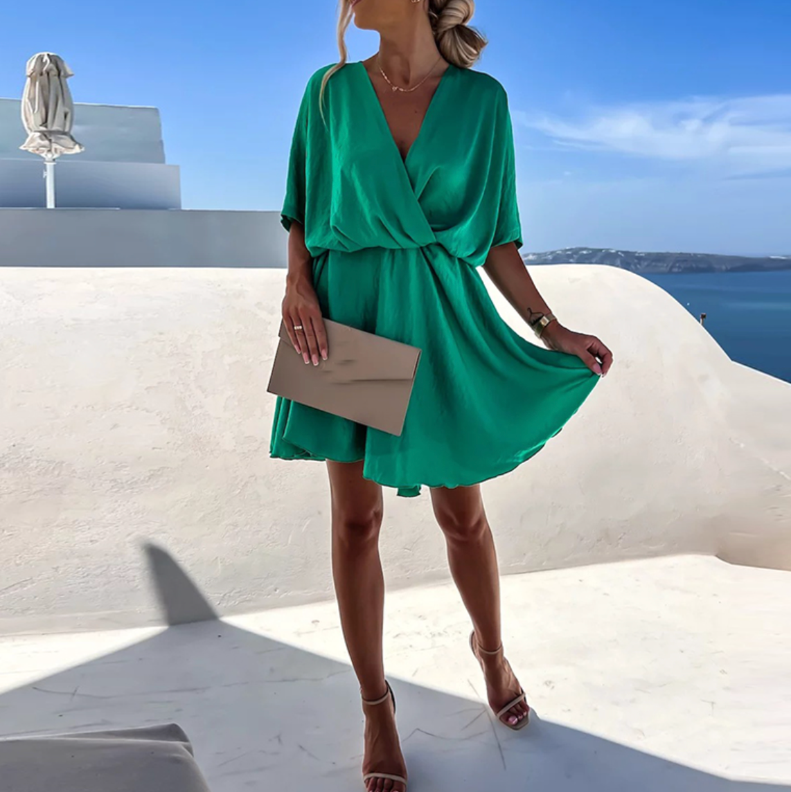 Elegante abito a portafoglio con vestibilità comoda per donna