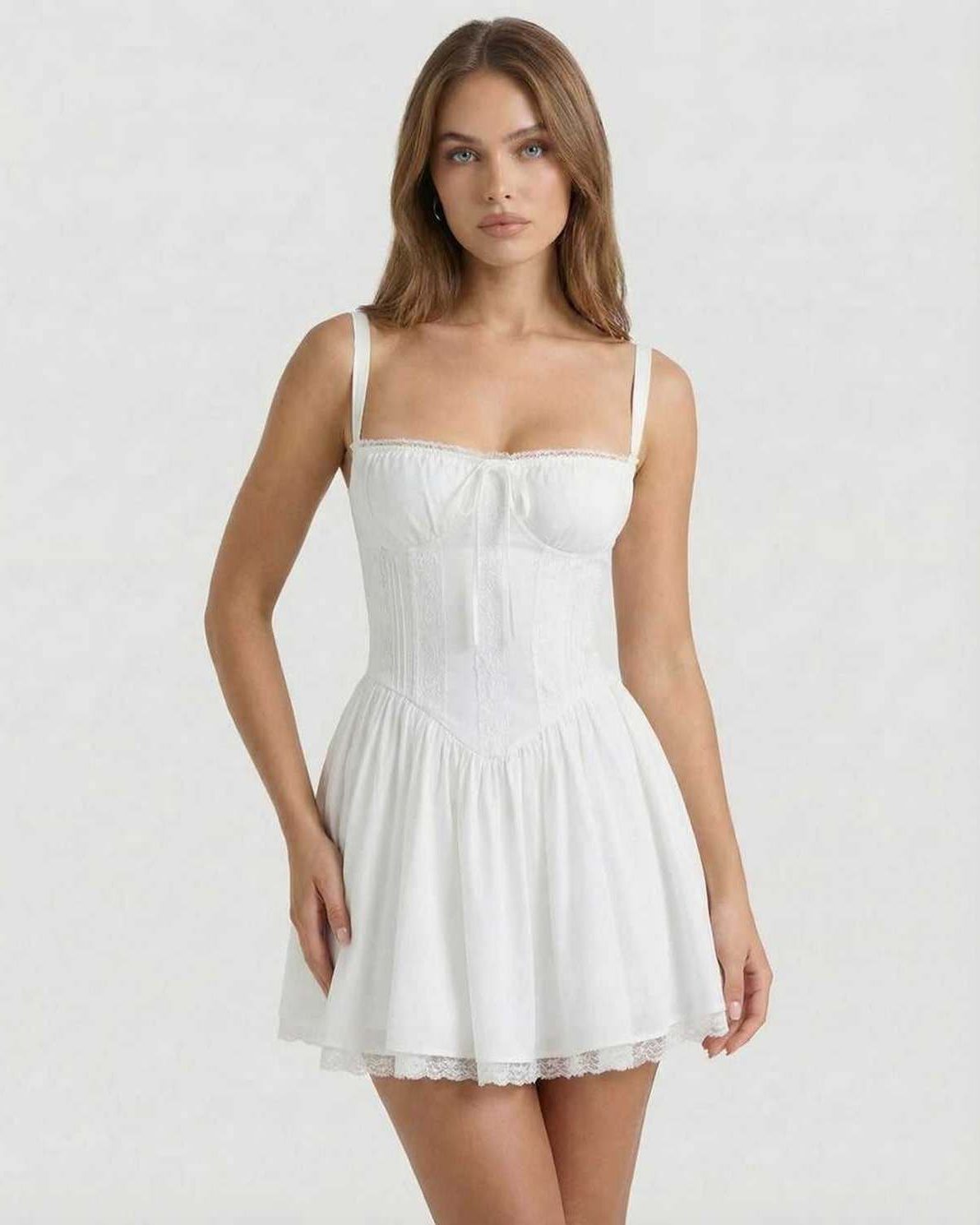 Elara Mini Dress by Lauven, white corset style with lace trim, A-line silhouette, feminine comfort.