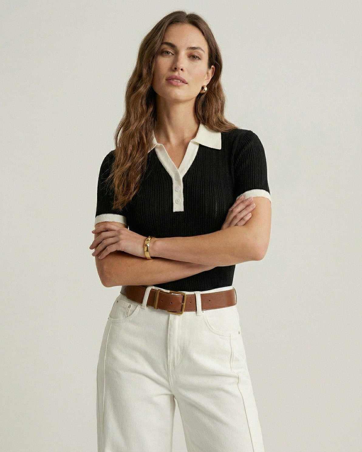 Siena Polo Shirt by Lauven, women's black polo shirt with classic contrast trim and a refined silhouette.