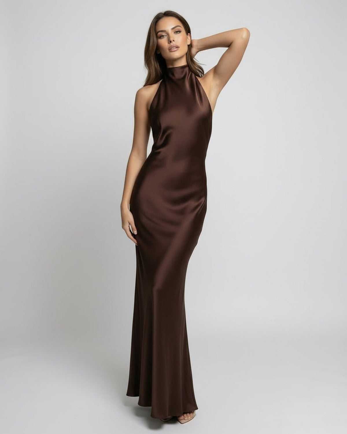 Monaco Maxi Dress | Elegant brown satin maxi dress with halter neck by Lauven, showcasing a fluid silhouette and polished look.
