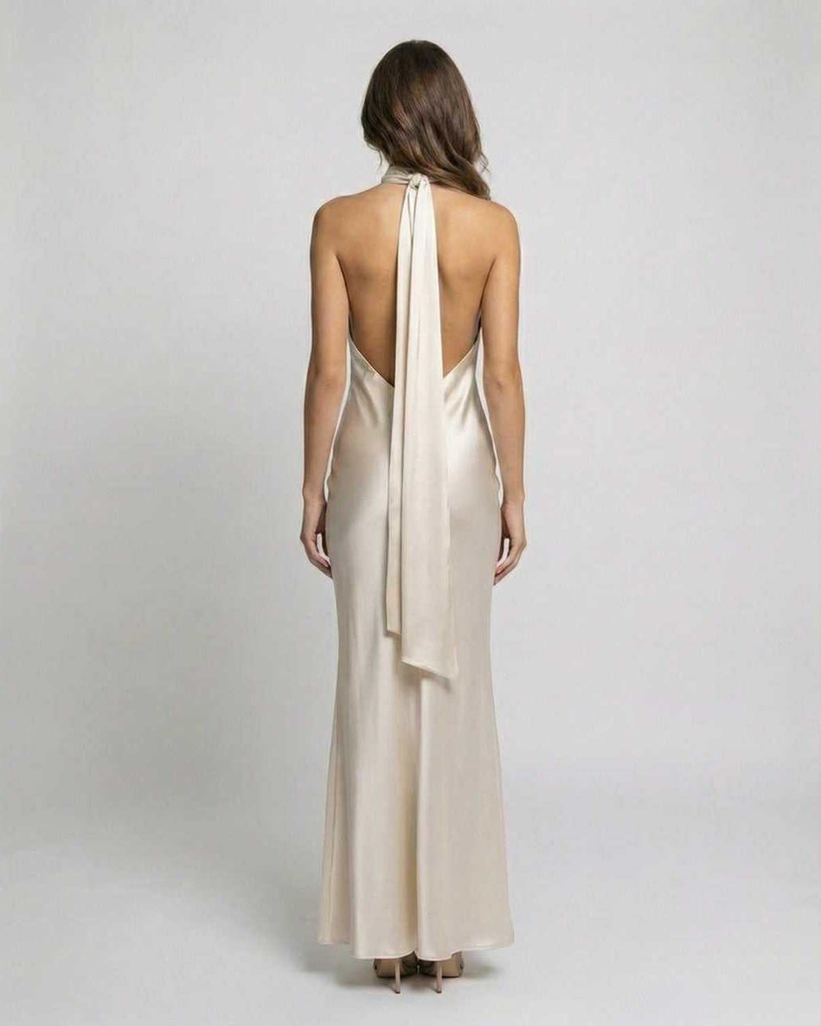 Sienna Maxi Dress back view, champagne satin finish, elegant halter neck design by Lauven.