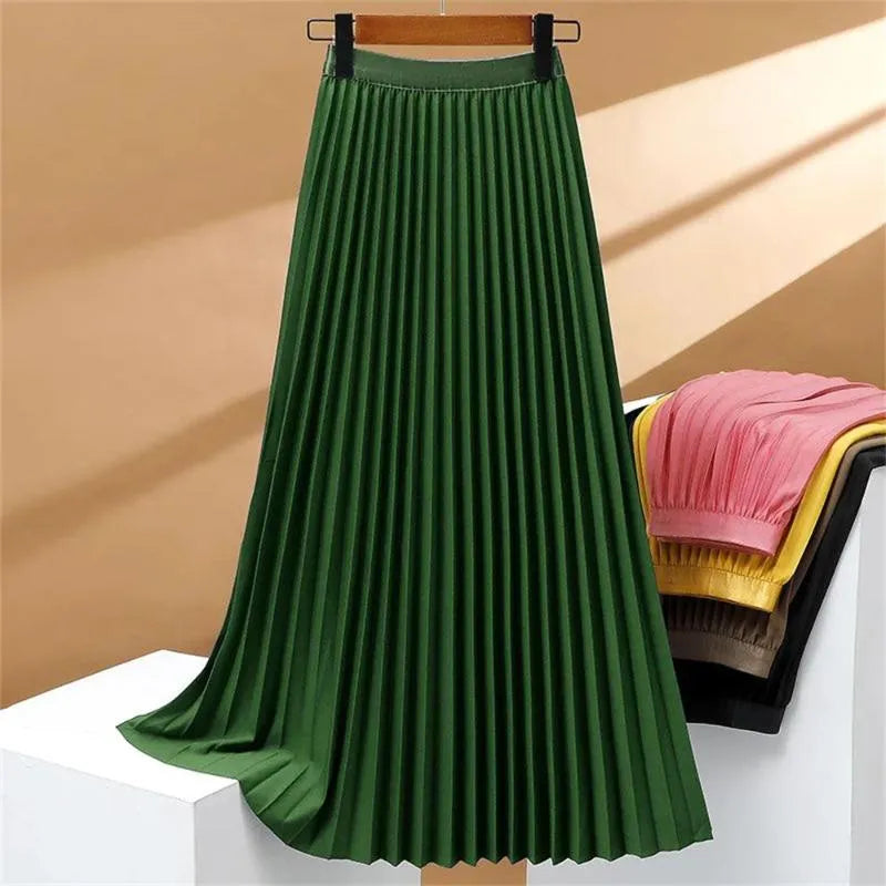 Gonna lunga plissettata elasticizzata a vita alta, elegante e confortevole, perfetta per un look sofisticato e femminile.