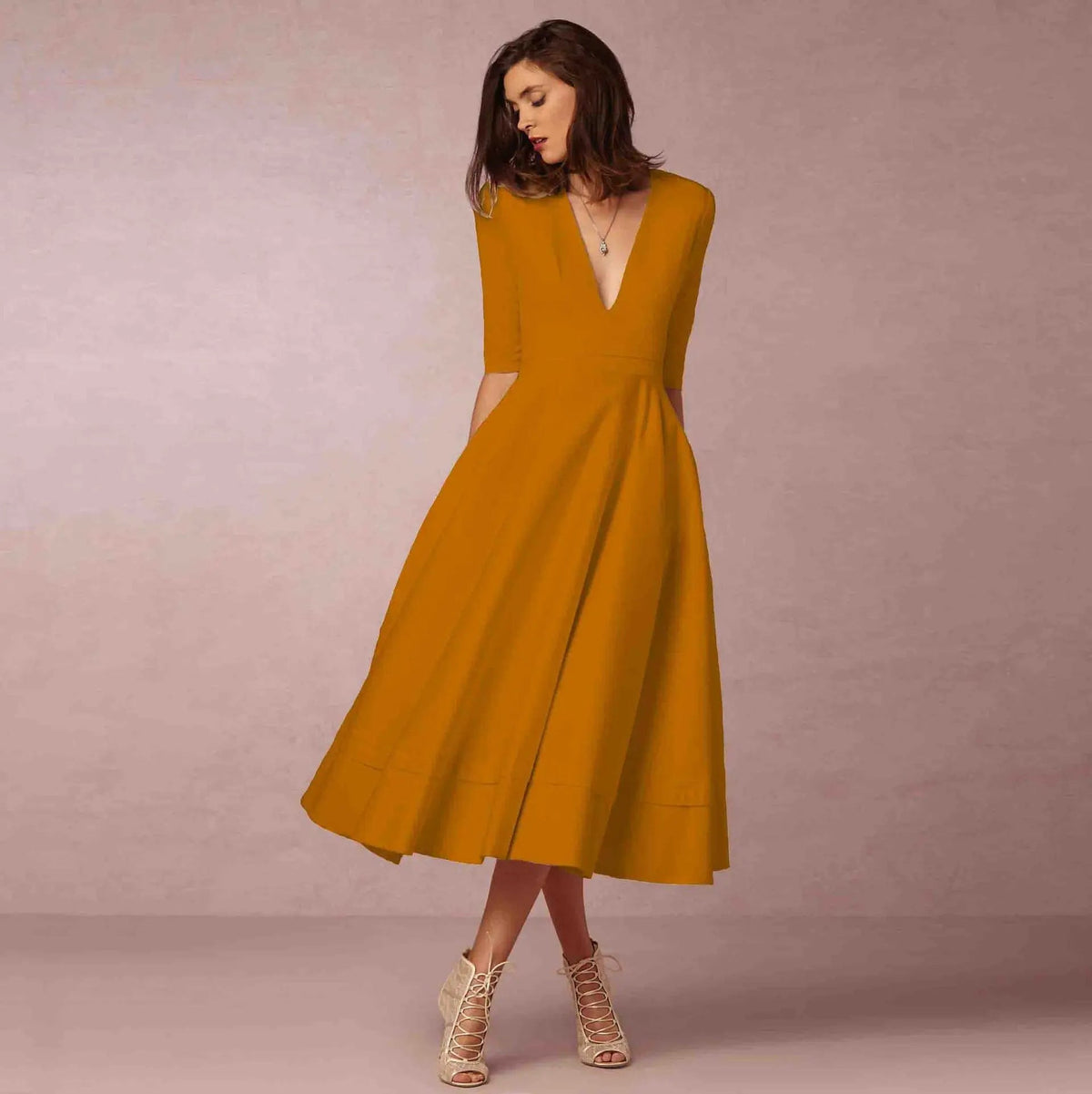 Vestito midi con scollo a V e maniche al gomito da donna