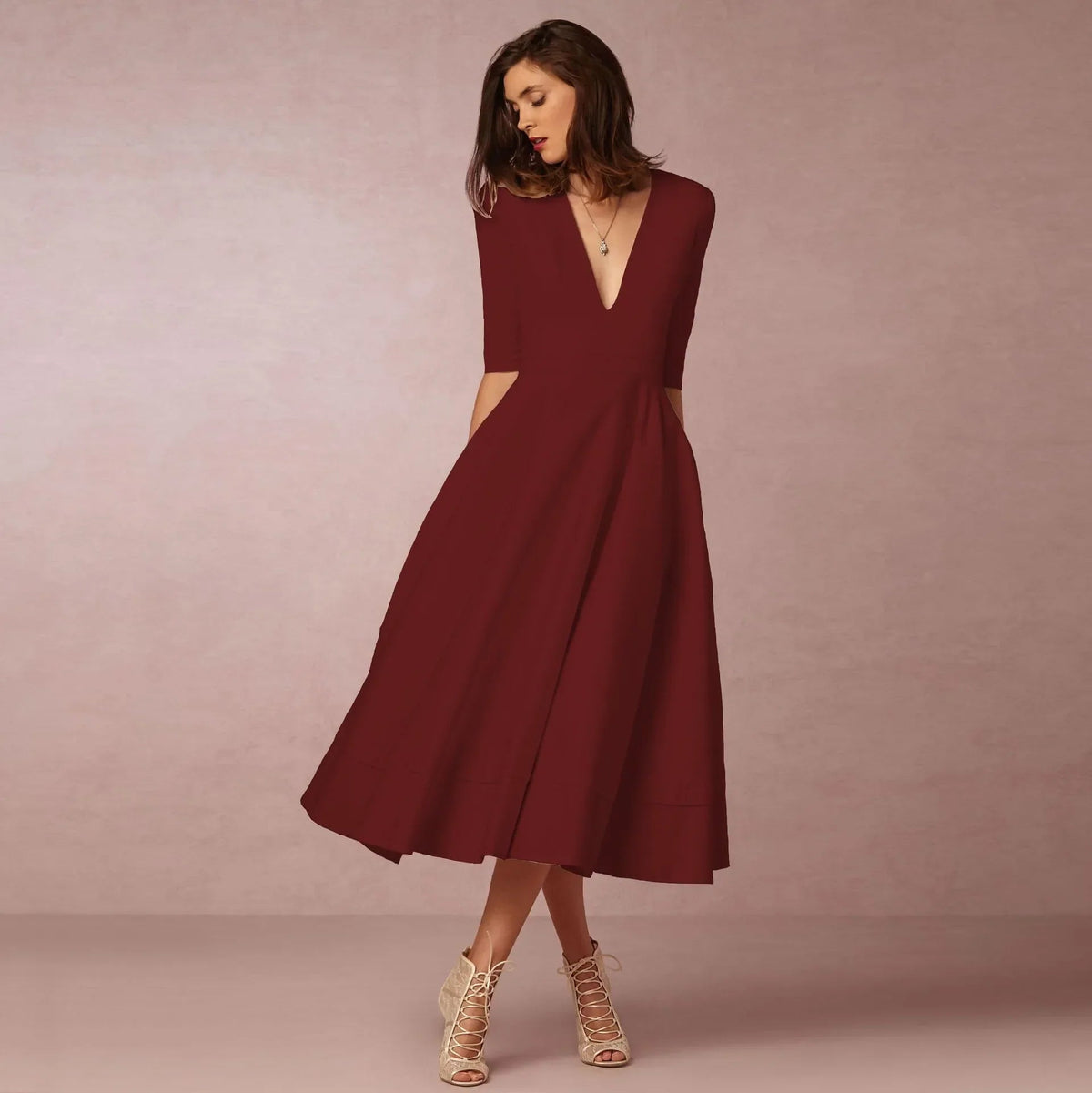 Vestito midi con scollo a V e maniche al gomito da donna
