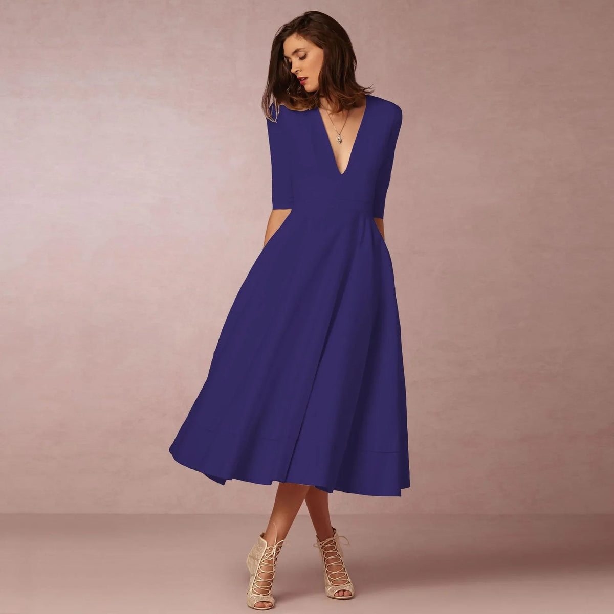 Vestito midi con scollo a V e maniche al gomito da donna