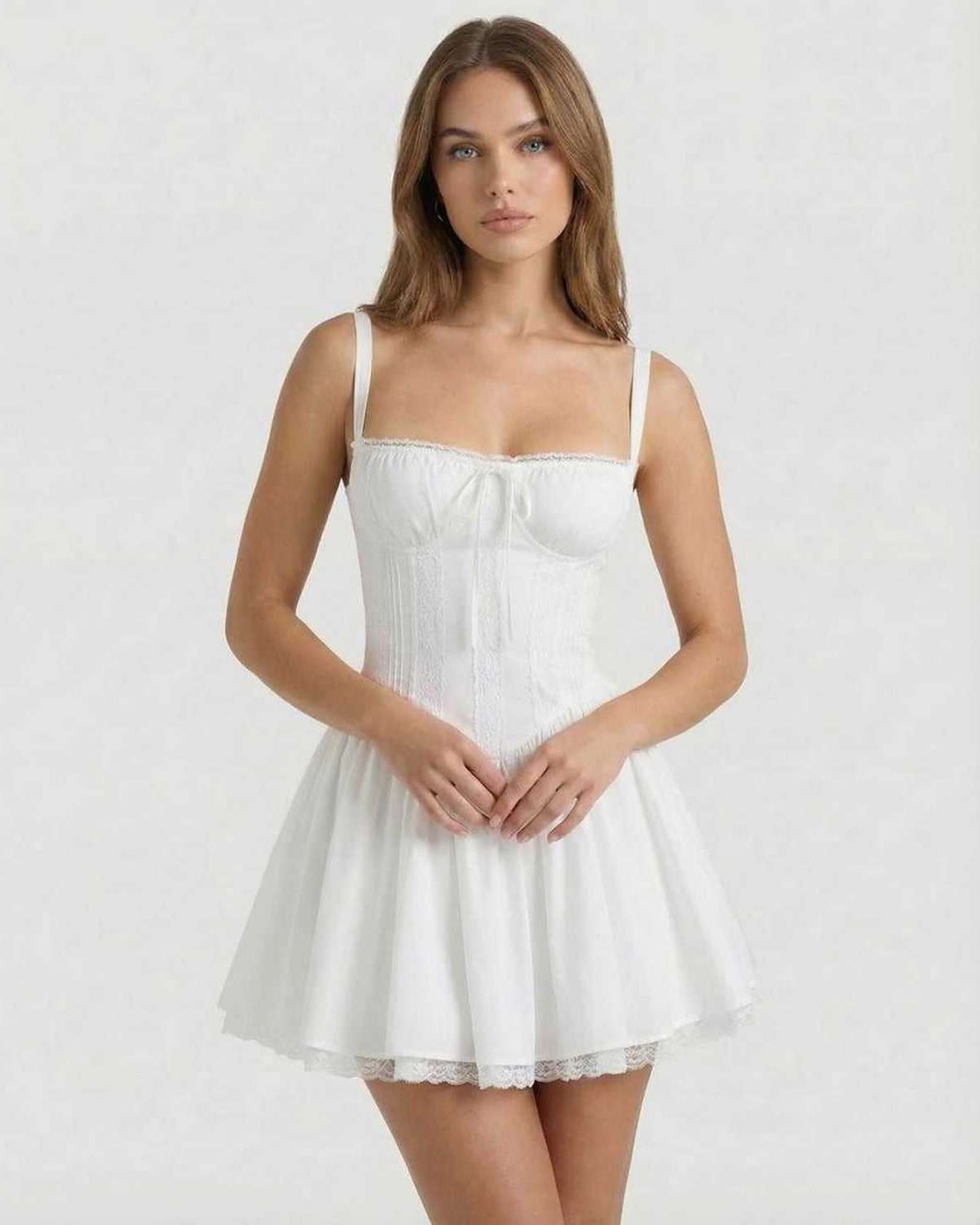 Elara Mini Dress - White corset-style mini dress with lace trim, A-line skirt, by Lauven, blending femininity and modern style.