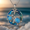 Collana da donna con tartaruga marina in opale blu e cerchio tropicale