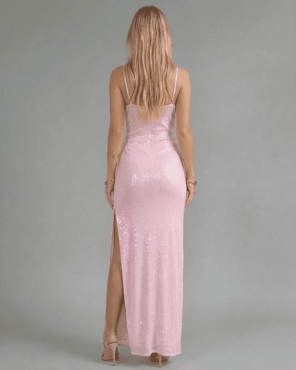 Celeste Maxi Dress by Lauven in shimmering pink sequins, featuring a sexy slit and a sleek back silhouette.